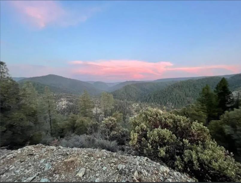 25510 Arctic Mine Road Nevada City, CA 95959 - Photo 4 of 11 a view of a mountain range with trees in the background