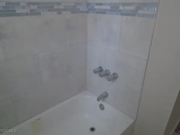 a bathroom with a tub