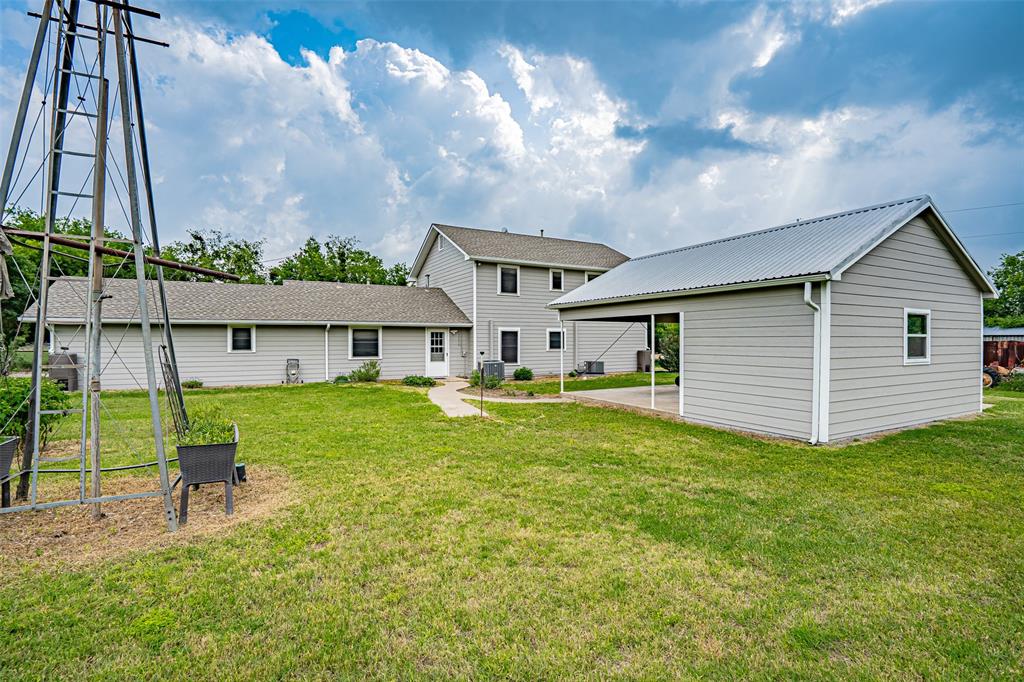 501 Endora Dublin, TX 76446 - Photo 34 of 39 a front view of house with yard and seating area