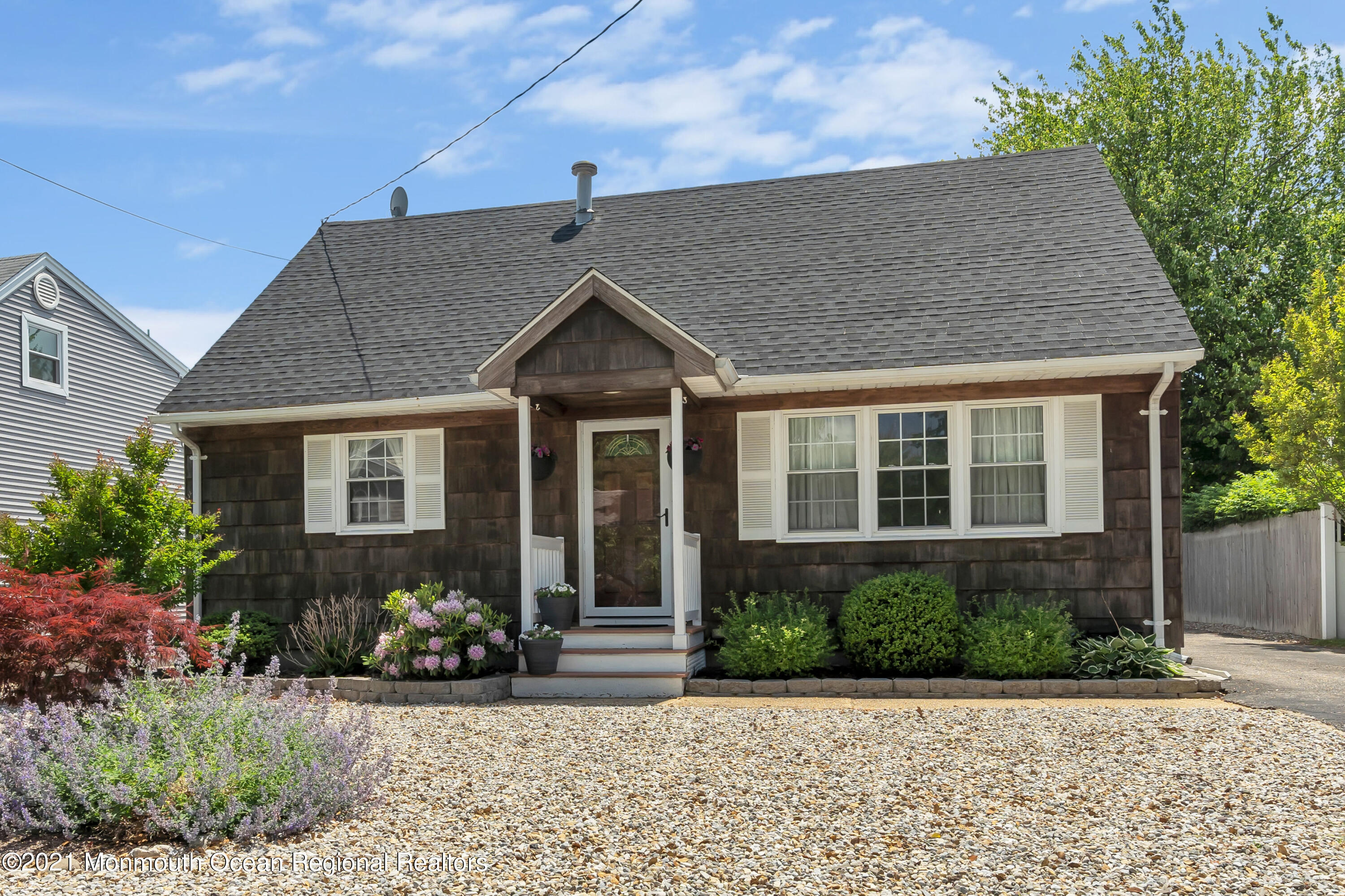 2212 Kenneth Road Point Pleasant, NJ 08742 - Photo 2 of 43 a front view of a house with a yard