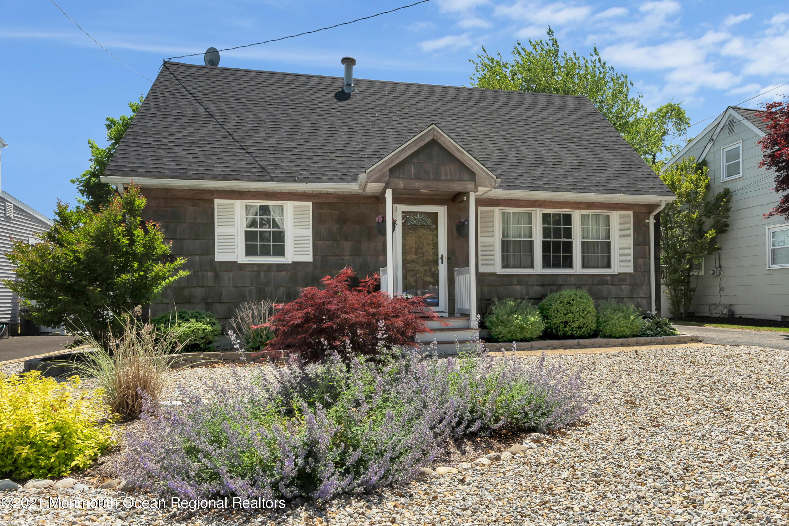 2212 Kenneth Road Point Pleasant, NJ 08742 - Photo 3 of 43 a front view of a house with a yard