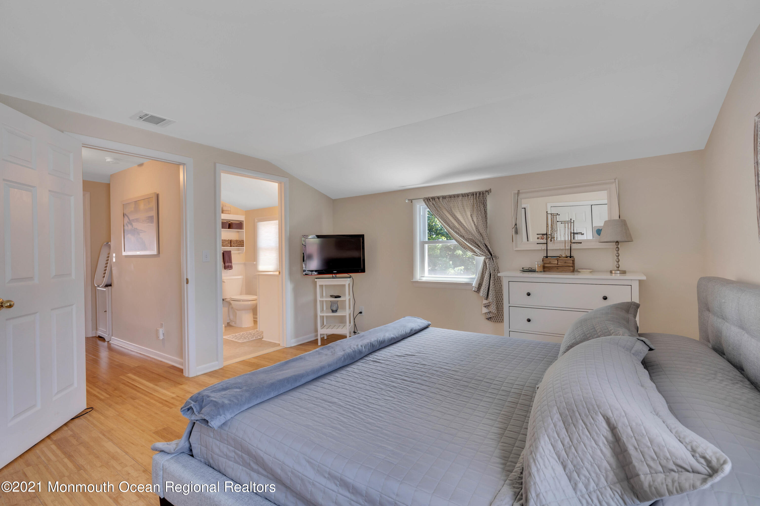 2212 Kenneth Road Point Pleasant, NJ 08742 - Photo 29 of 43 a bedroom with a bed and a view of kitchen