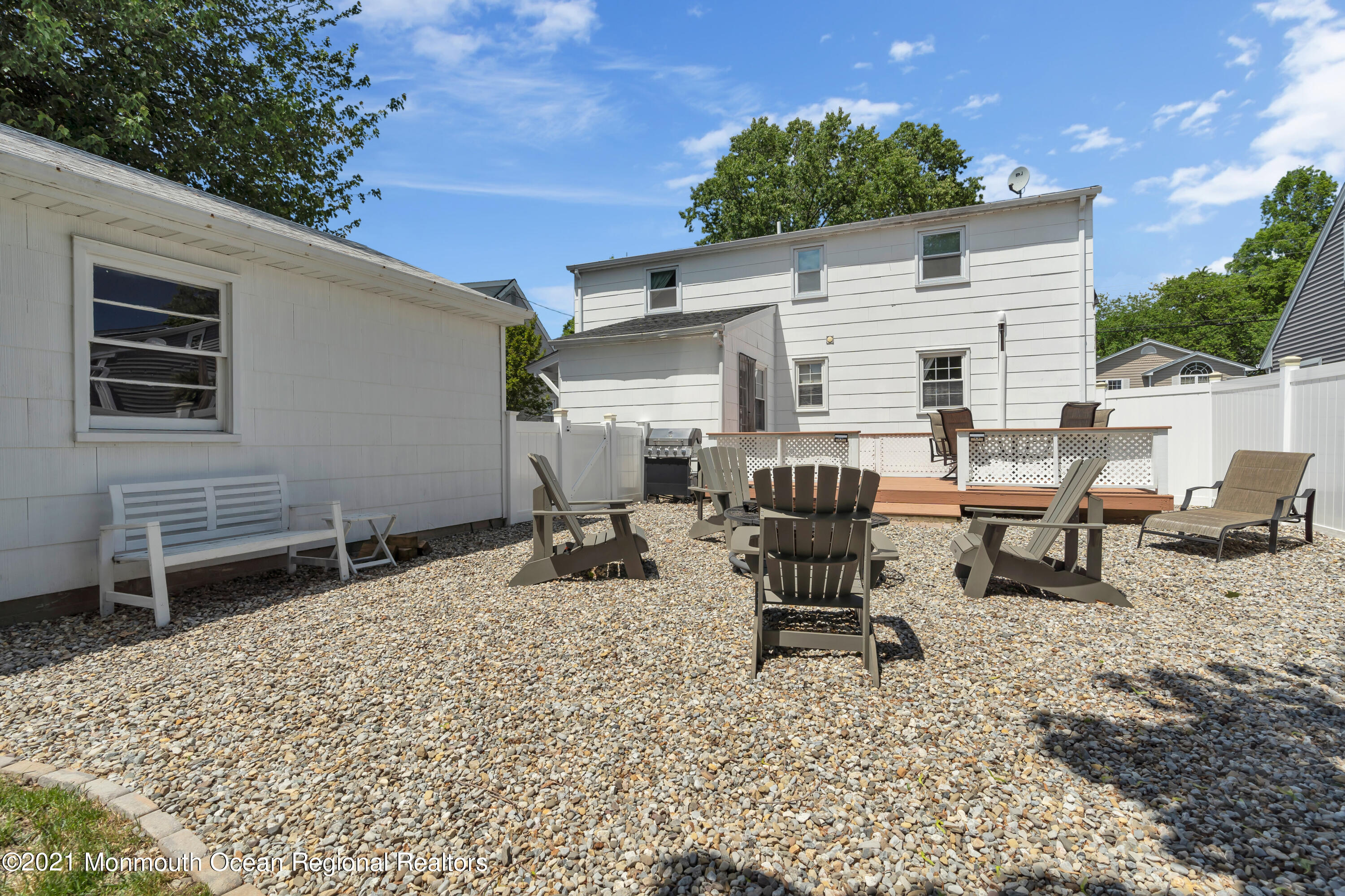 2212 Kenneth Road Point Pleasant, NJ 08742 - Photo 41 of 43 a backyard of a house with table and chairs