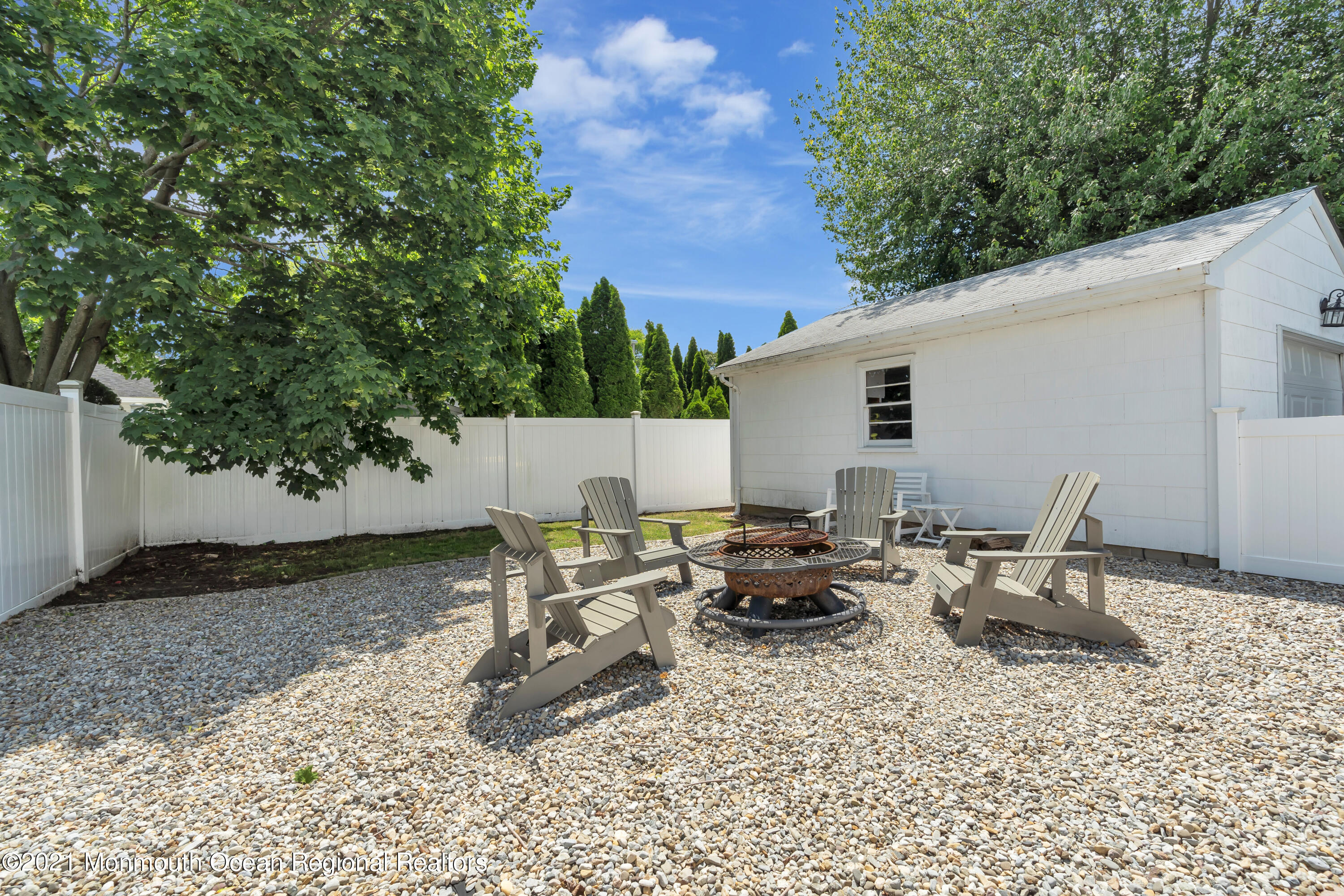 2212 Kenneth Road Point Pleasant, NJ 08742 - Photo 42 of 43 a backyard of a house with table and chairs