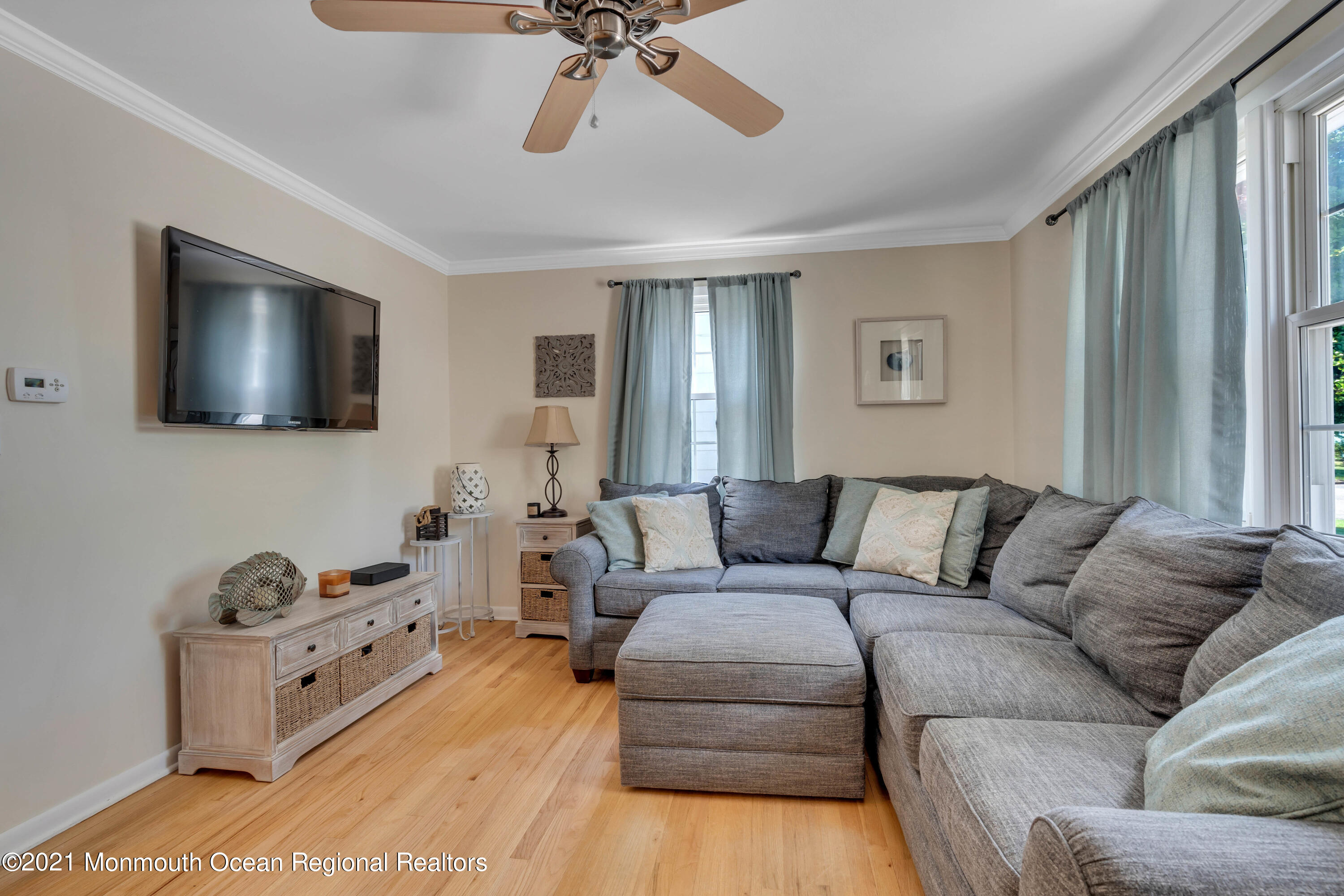 2212 Kenneth Road Point Pleasant, NJ 08742 - Photo 7 of 43 a living room with furniture and a flat screen tv