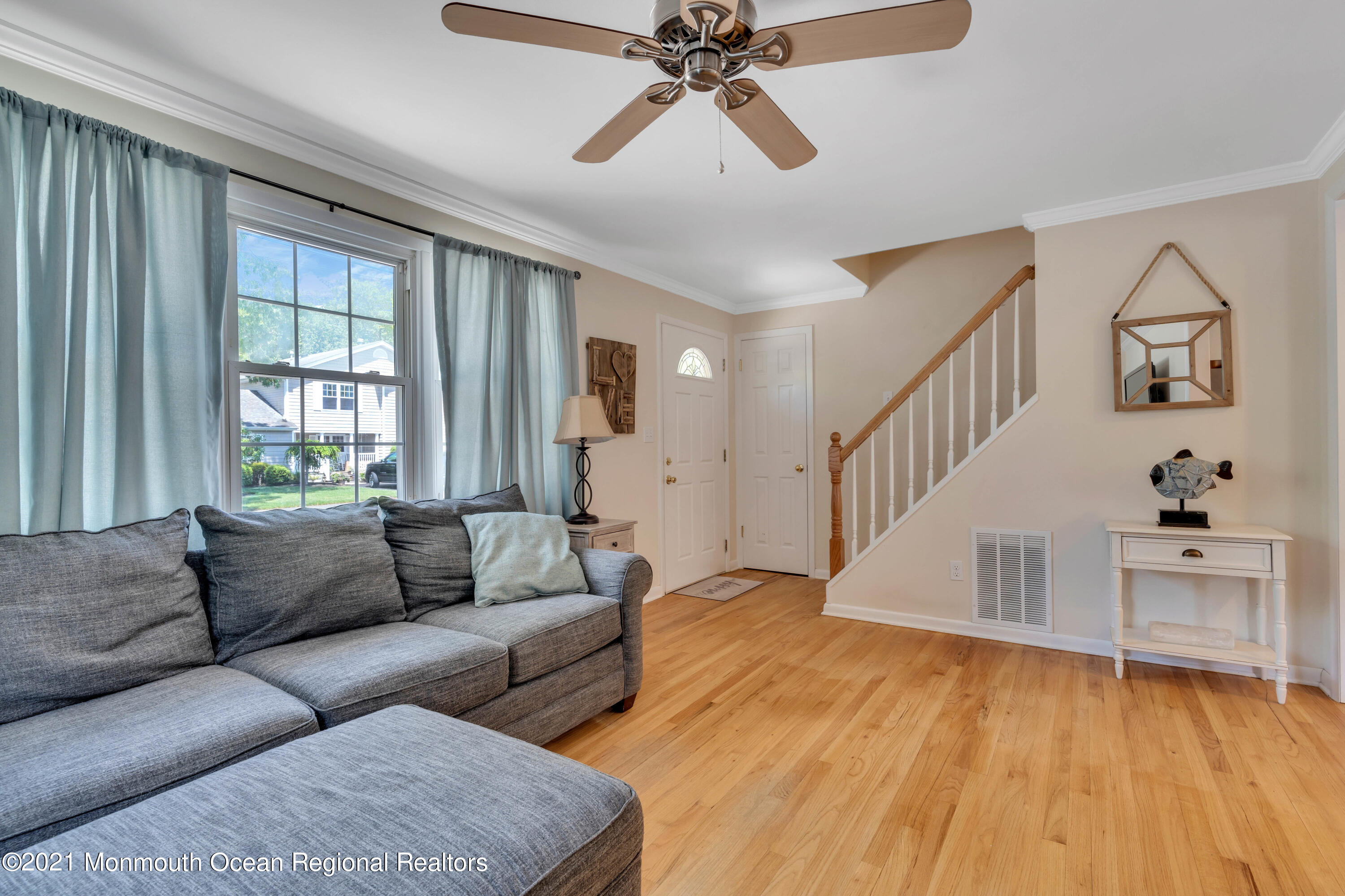 2212 Kenneth Road Point Pleasant, NJ 08742 - Photo 9 of 43 a living room with furniture and a wooden floor