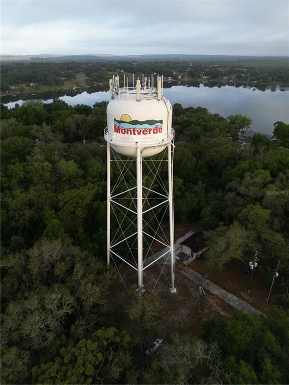 17710 Broad Street Montverde, FL 34756 - Photo 8 of 34 a view of a room with wooden floor and lake view