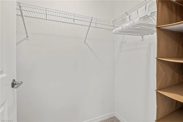 a view of a room with racks on the wall