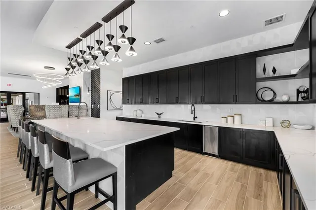 a kitchen with a table and chairs in it