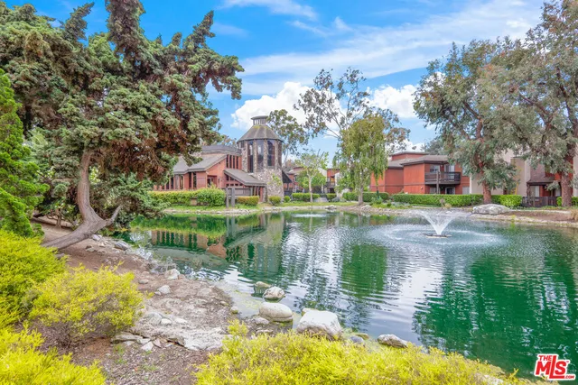 a view of a lake with houses