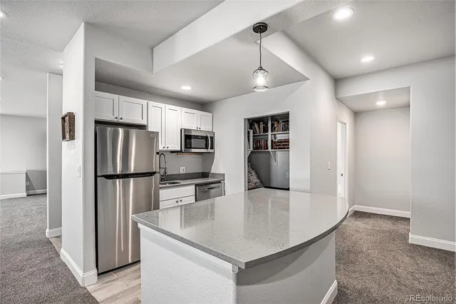 a large living room with a couch