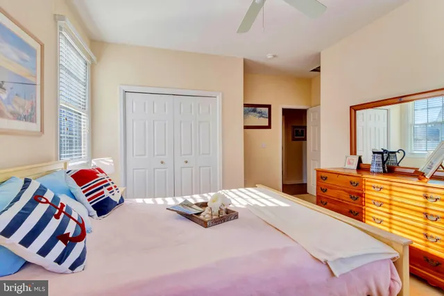 a bedroom with a bed and a cabinets