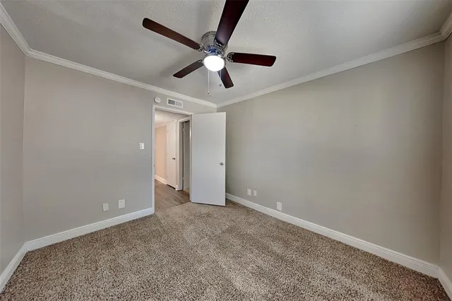 a bathroom with a granite countertop sink a mirror and vanity
