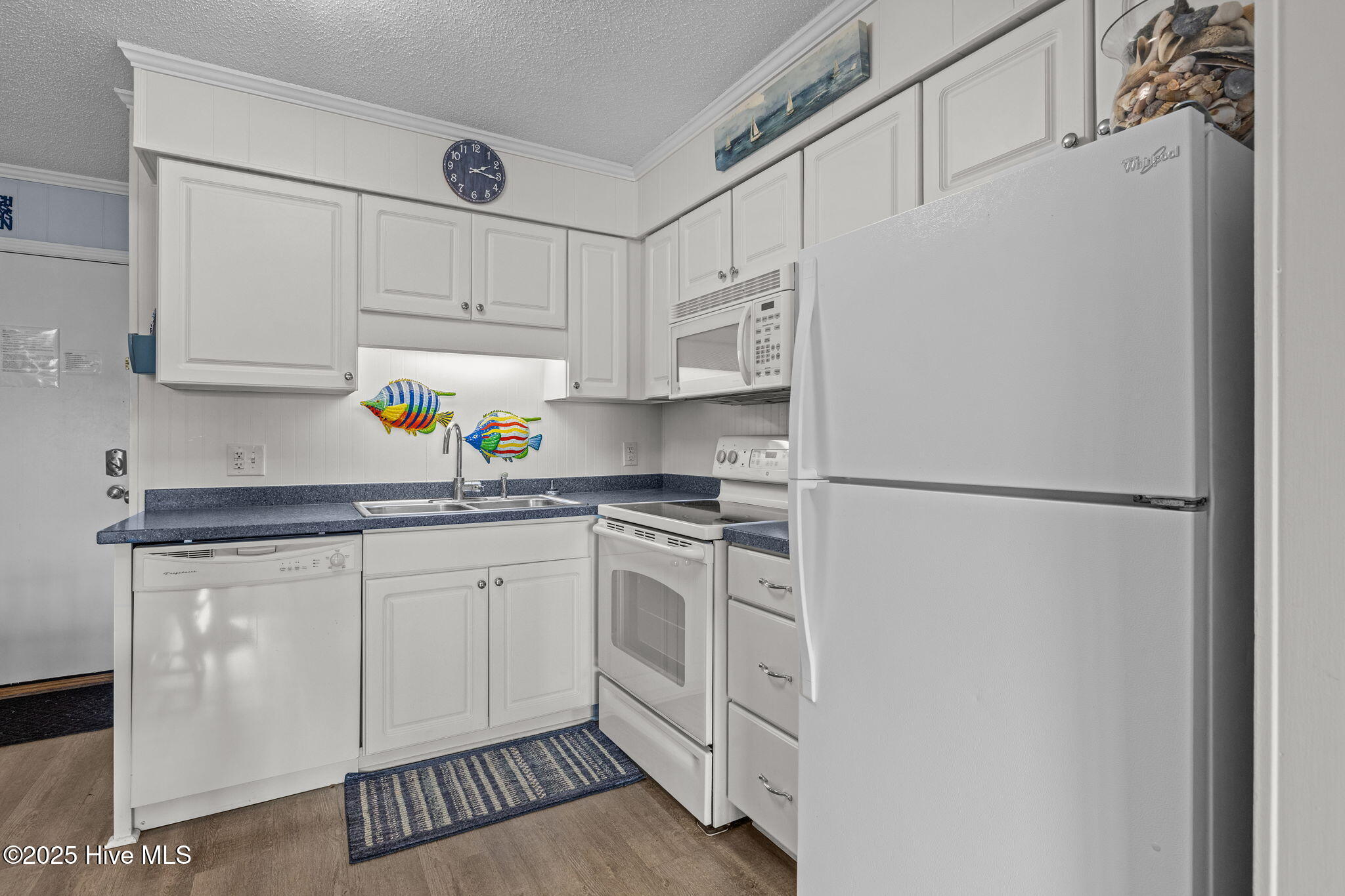 2008 East Fort Macon Road East, Unit H11 Atlantic Beach, NC 28512 - Photo 11 of 54 Kitchen w/ White Fridge