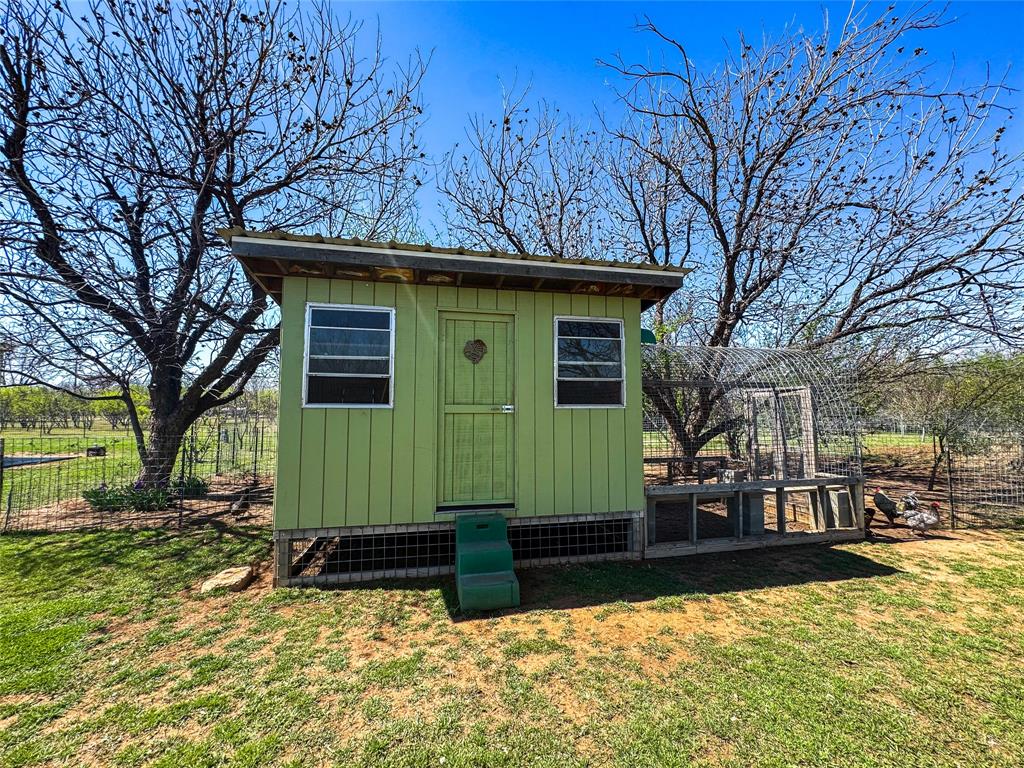 1209 Taylor Avenue Rule, TX 79547 - Photo 22 of 40 a view of a house with a yard