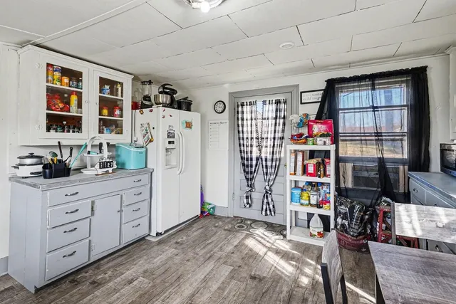 a bed room with a bed and a walk in closet