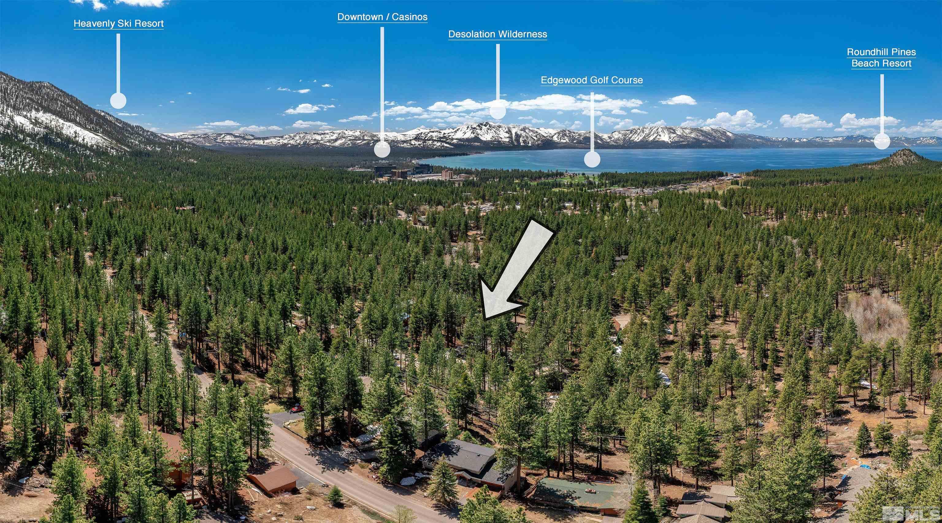 191 William Lane Stateline, NV 89449 - Photo 2 of 4 a view of a swimming pool with an outdoor space and seating