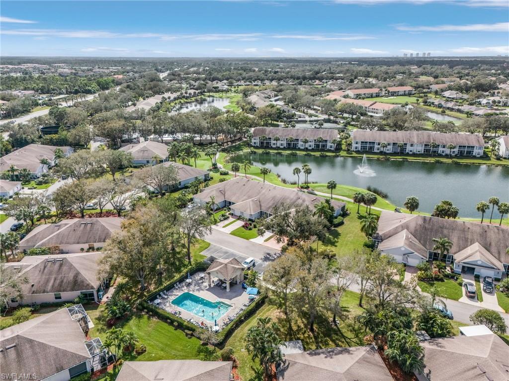 20681 Country Barn Drive Estero, FL 33928 - Photo 38 of 42 an aerial view of a city with lots of residential buildings lake and ocean view