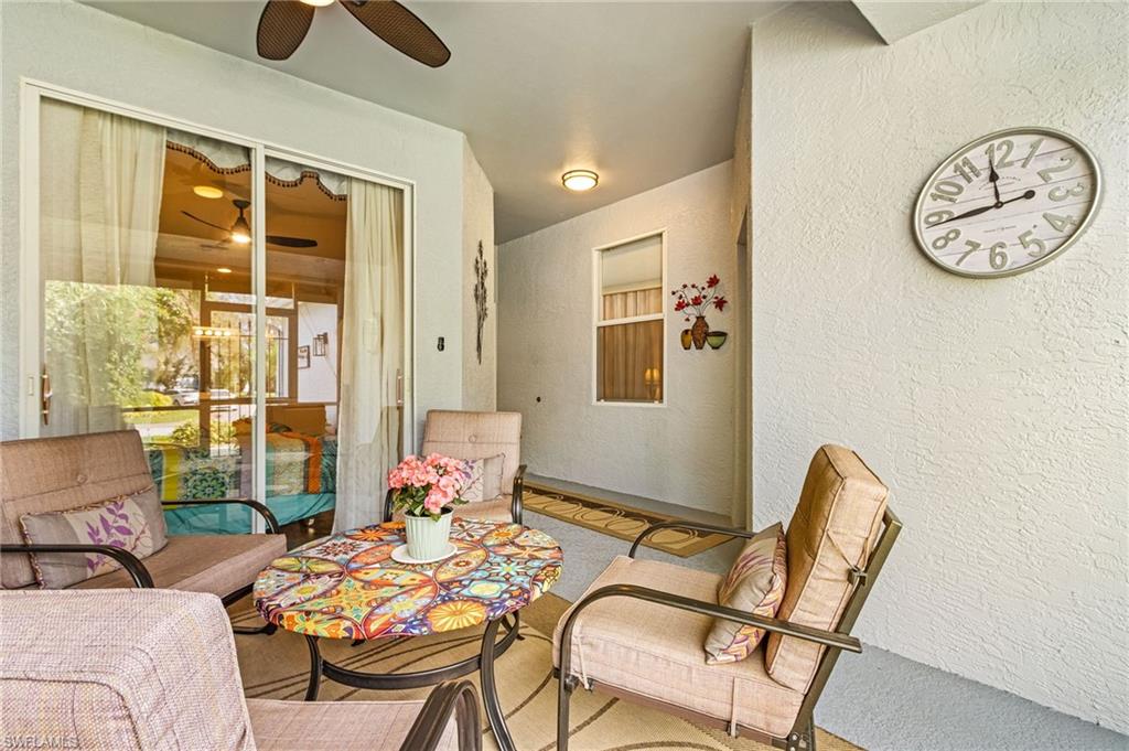 20681 Country Barn Drive Estero, FL 33928 - Photo 4 of 42 a living room with furniture and wooden floor