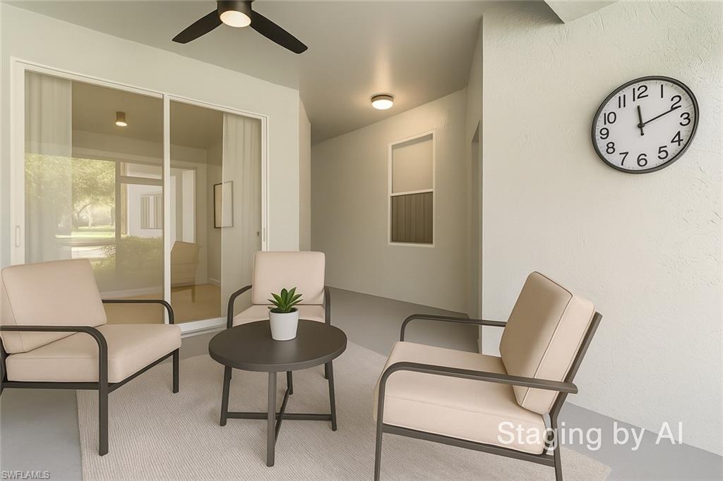 20681 Country Barn Drive Estero, FL 33928 - Photo 5 of 42 a living room with furniture and a large window