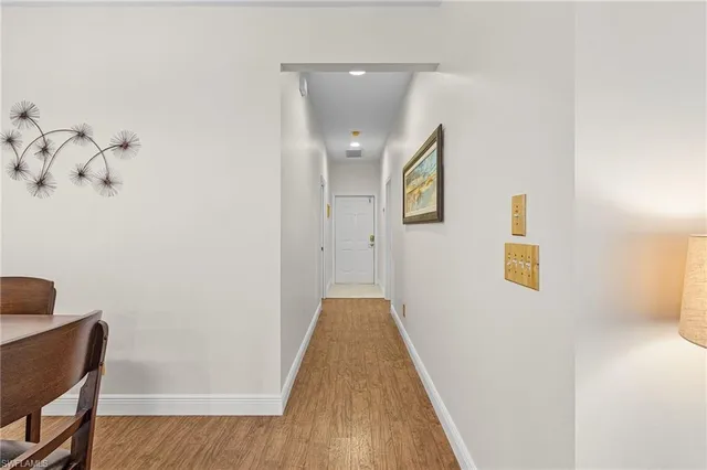 a view of a hallway with workspace