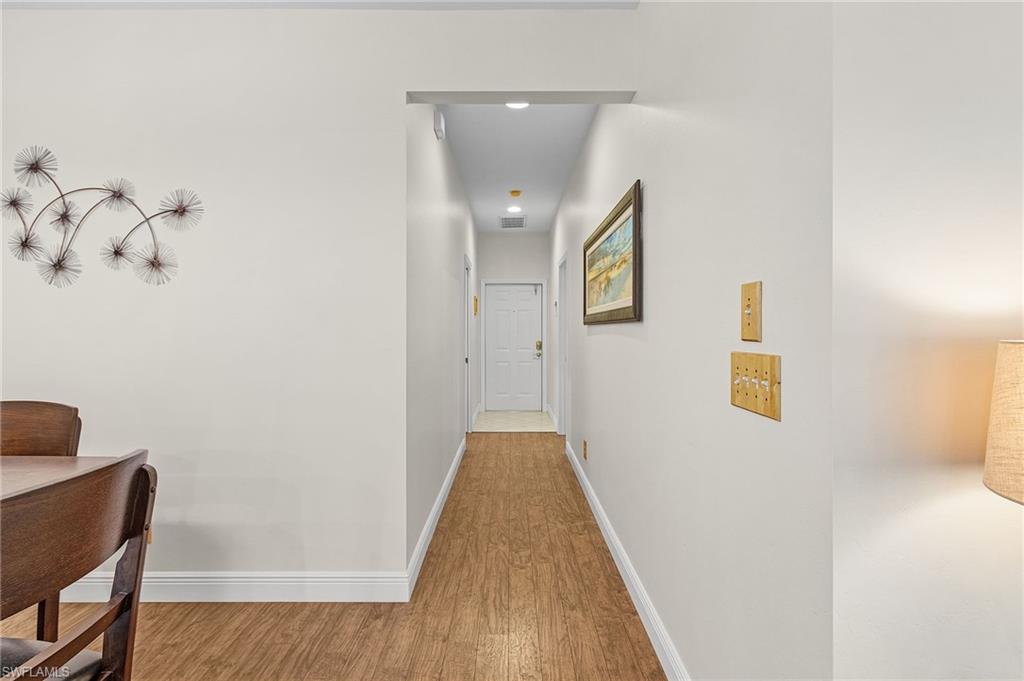 20681 Country Barn Drive Estero, FL 33928 - Photo 6 of 42 a view of a hallway with workspace