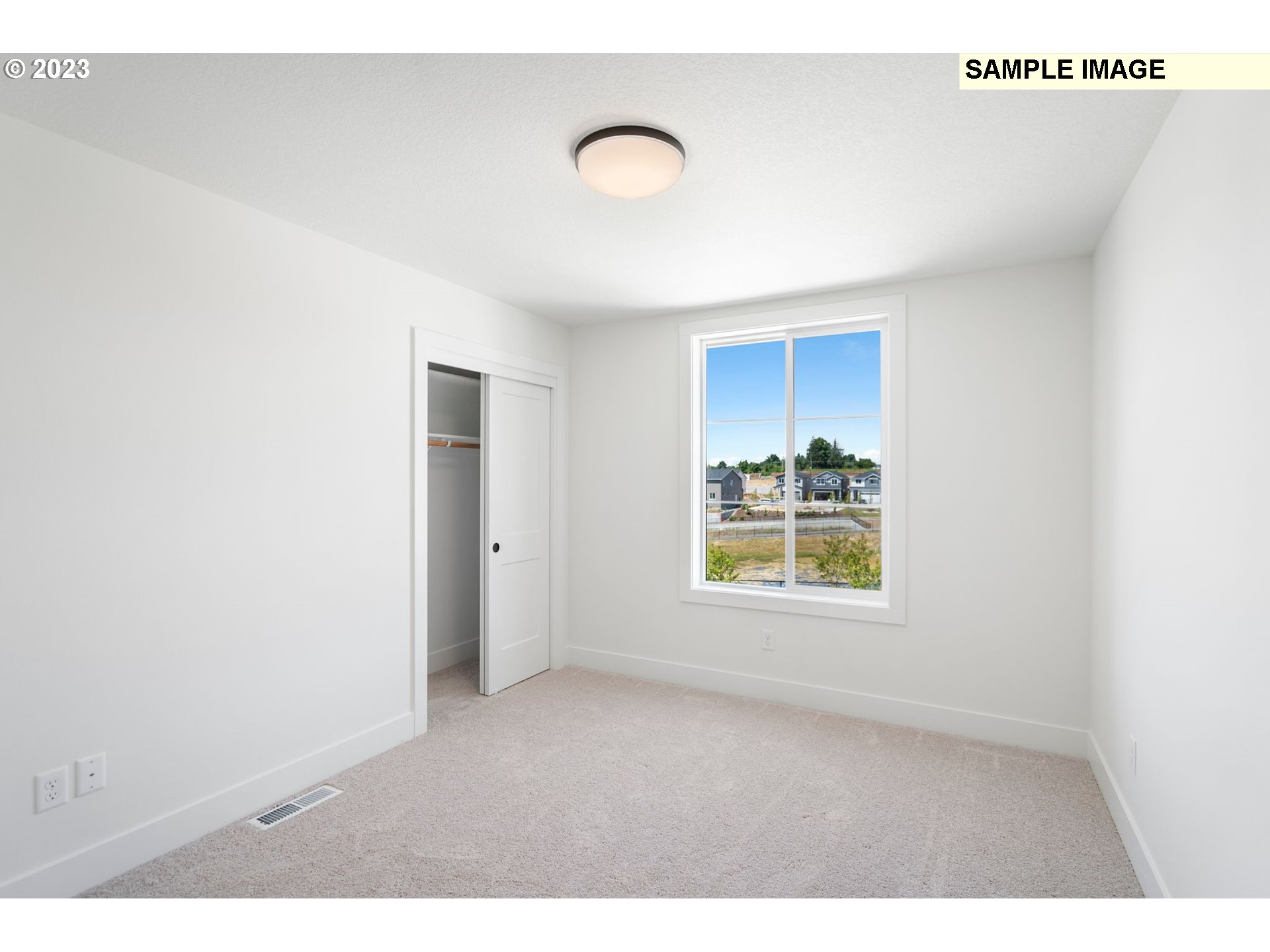 817 Northwest 175th Way Ridgefield, WA 98642 - Photo 8 of 20 a view of an empty room with a window