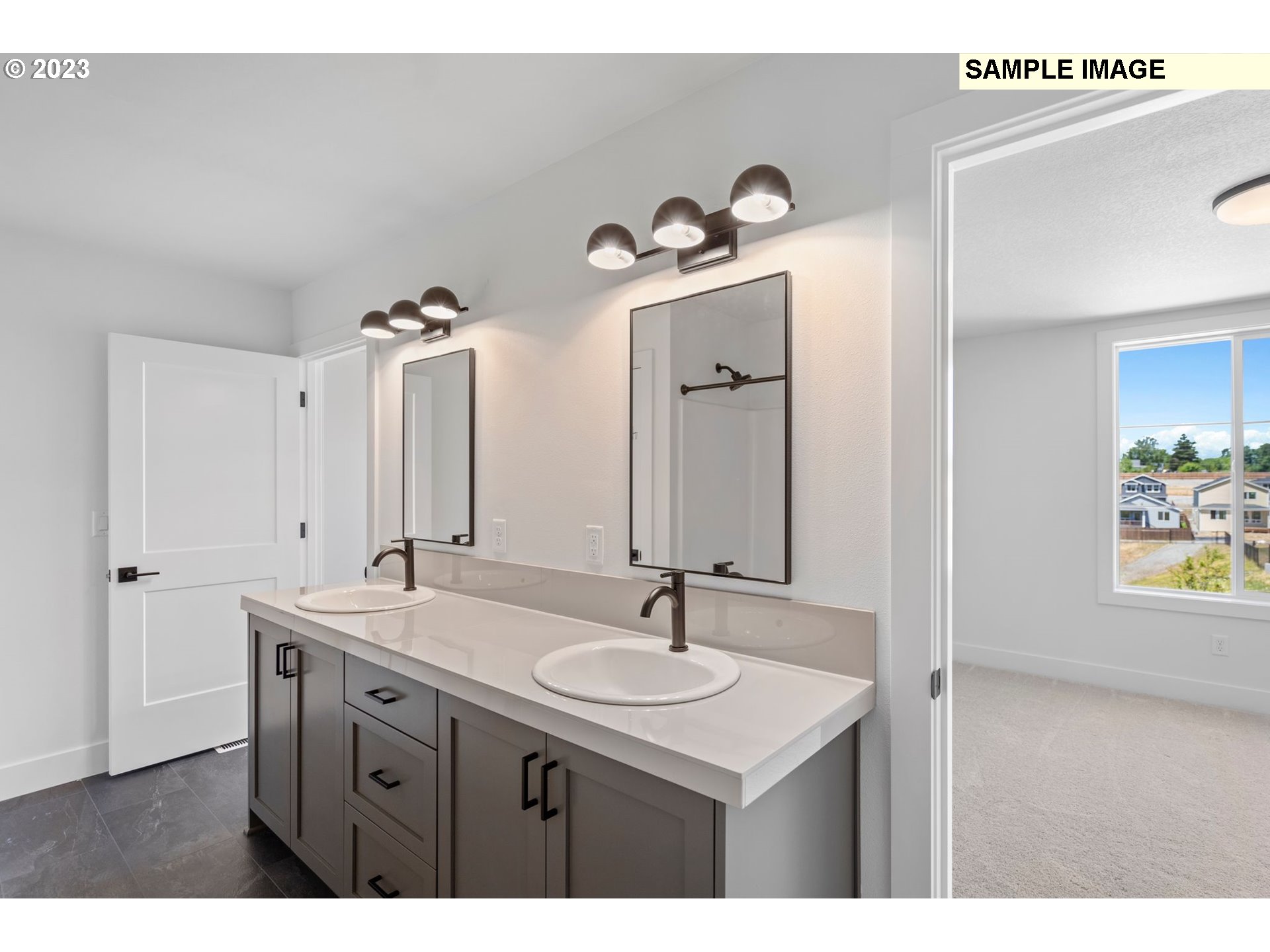 817 Northwest 175th Way Ridgefield, WA 98642 - Photo 9 of 20 a bathroom with a sink and a mirror