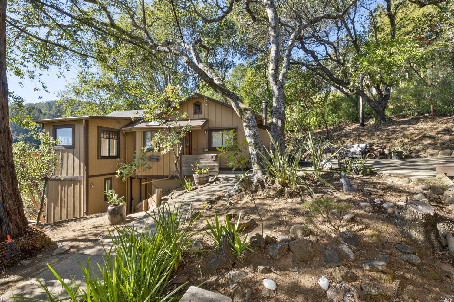 63 Bay Road Fairfax, CA 94930 - Photo 1 of 1 a view of a house with a tree in the background