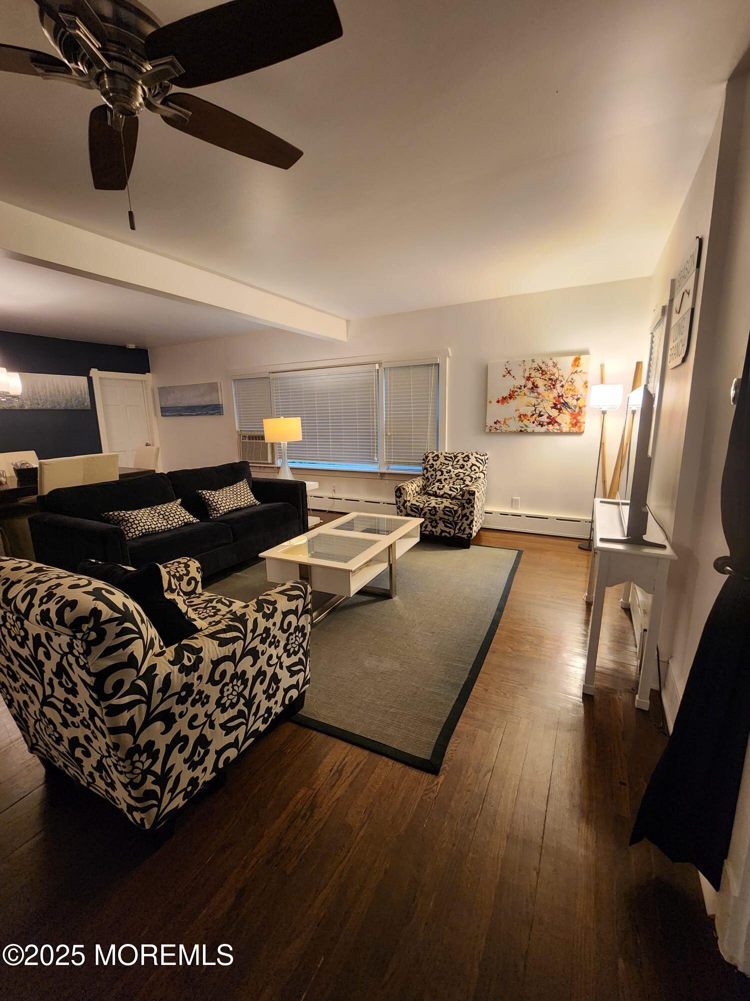 393 Bath Avenue Long Branch, NJ 07740 - Photo 19 of 22 a living room with furniture