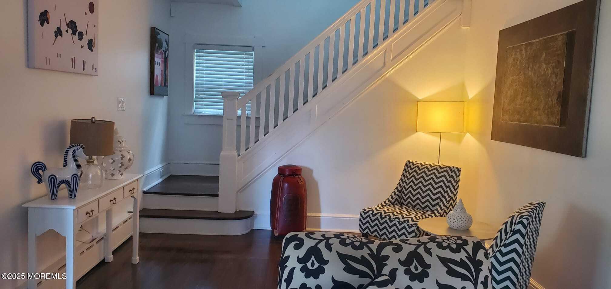 393 Bath Avenue Long Branch, NJ 07740 - Photo 9 of 22 a view of entryway and hall with wooden floor