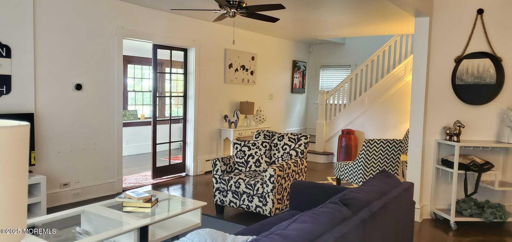 393 Bath Avenue Long Branch, NJ 07740 - Photo 10 of 22 a living room with furniture and a window