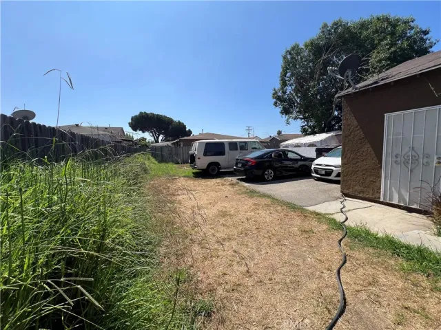 a view of a yard in front of a house