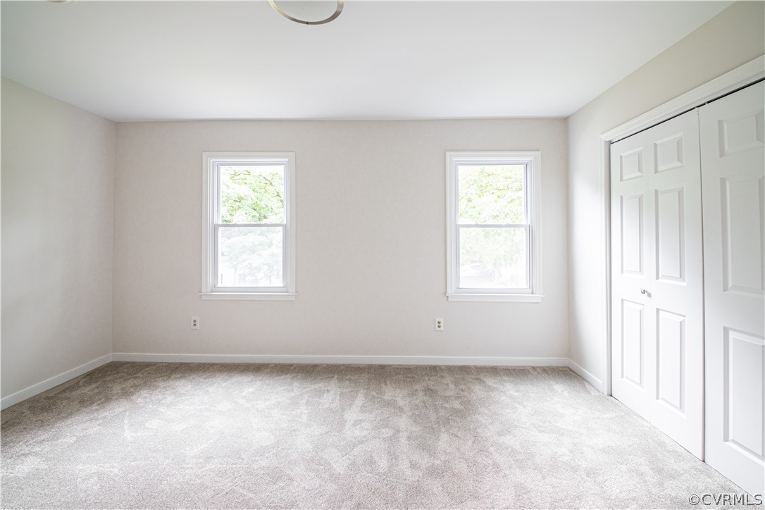 7507 Valencia Road Chesterfield, VA 23832 - Photo 21 of 41 an empty room with windows