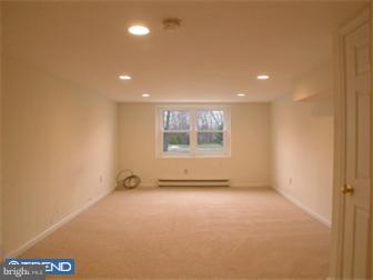 114 Midland Road Newtown, PA 18940 - Photo 7 of 12 an empty room with windows