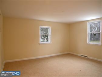 114 Midland Road Newtown, PA 18940 - Photo 9 of 12 an empty room with a window