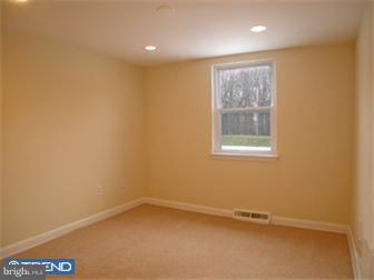 114 Midland Road Newtown, PA 18940 - Photo 10 of 12 an empty room with a window