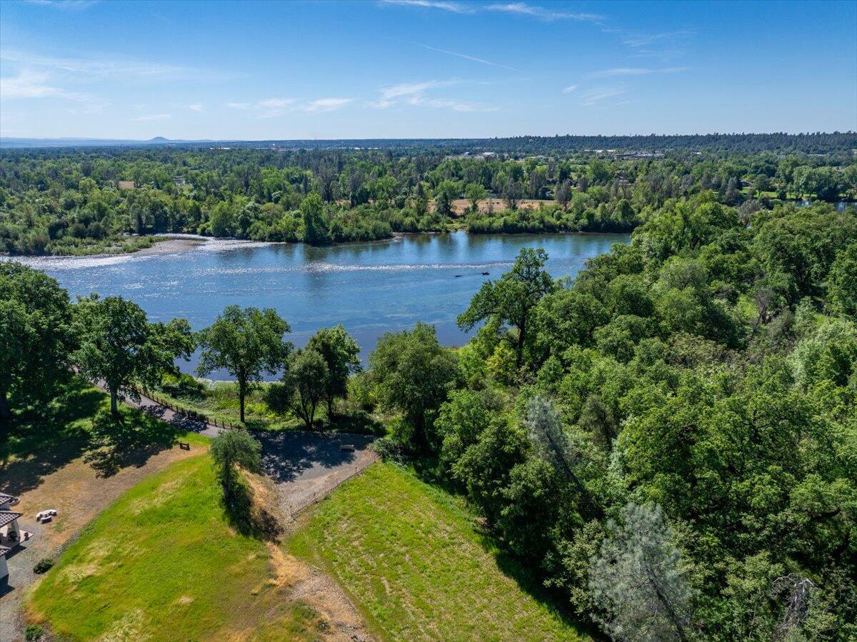 19301 Clover Road Redding, CA 96002 - Photo 1 of 18 an aerial view of a houses with a yard and lake view