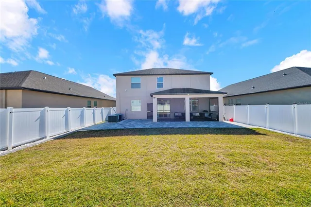a view of a house with swimming pool
