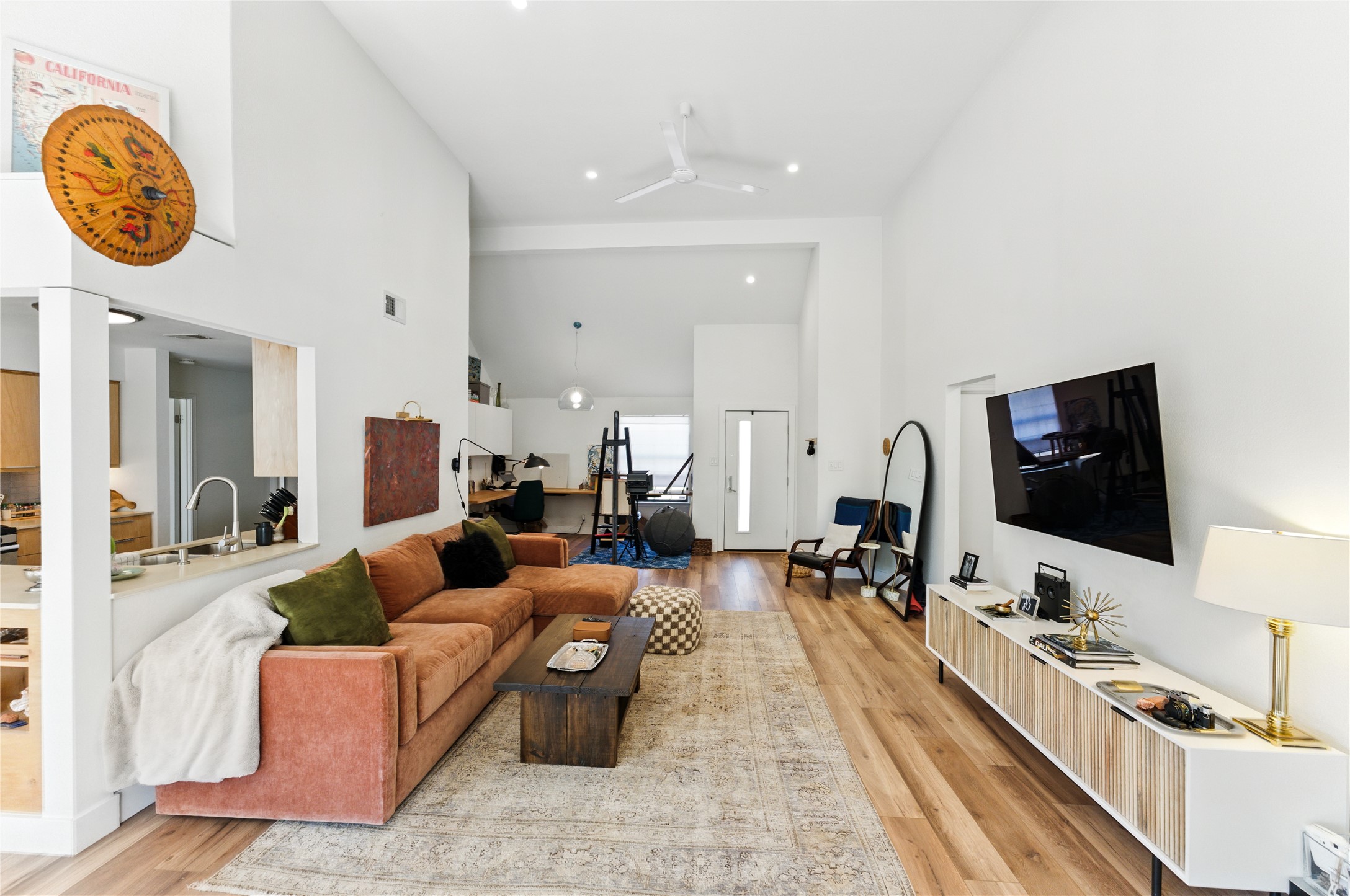 7701 Ponoma Trail Austin, TX 78749 - Photo 1 of 1 a living room with fireplace furniture and a flat screen tv
