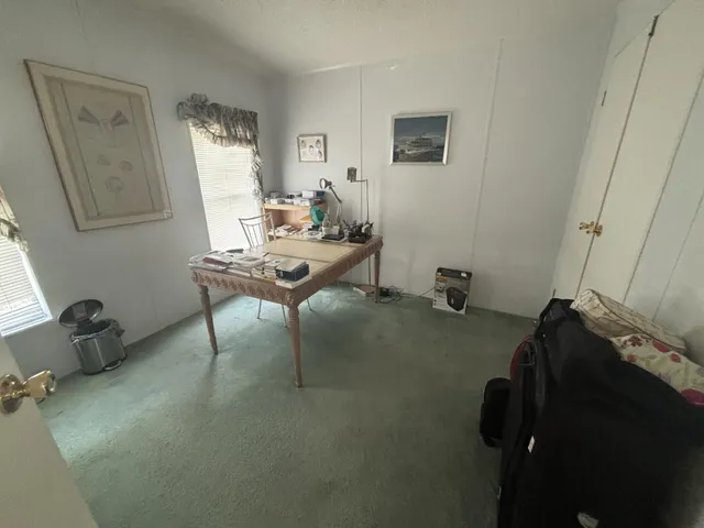 a room with furniture and a window