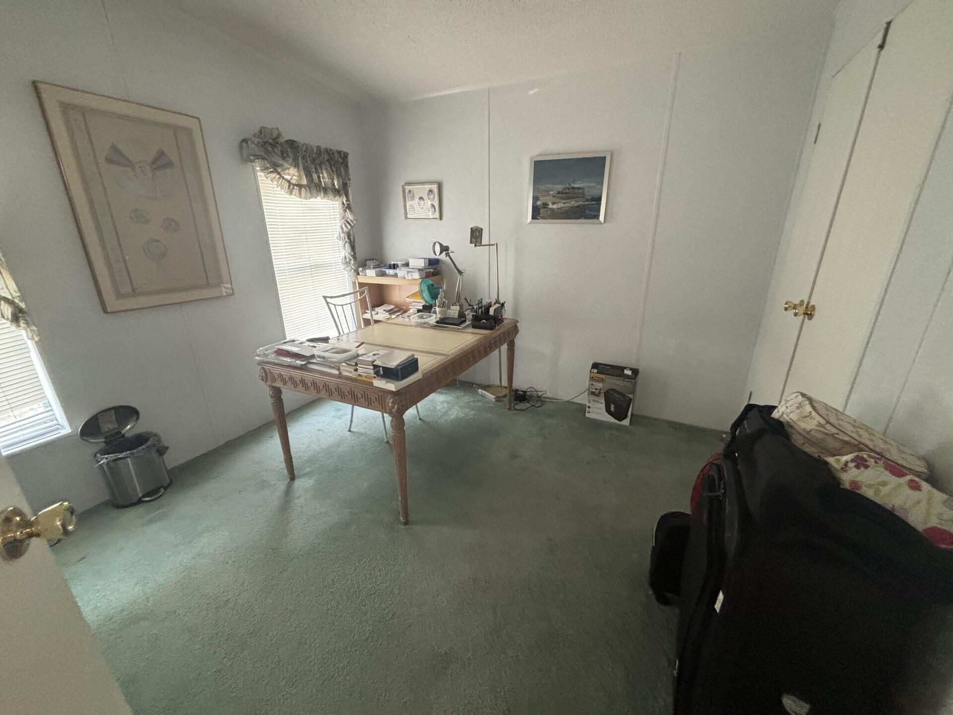 13281 Southwest 10th Manor Davie, FL 33325 - Photo 22 of 43 a room with furniture and a window