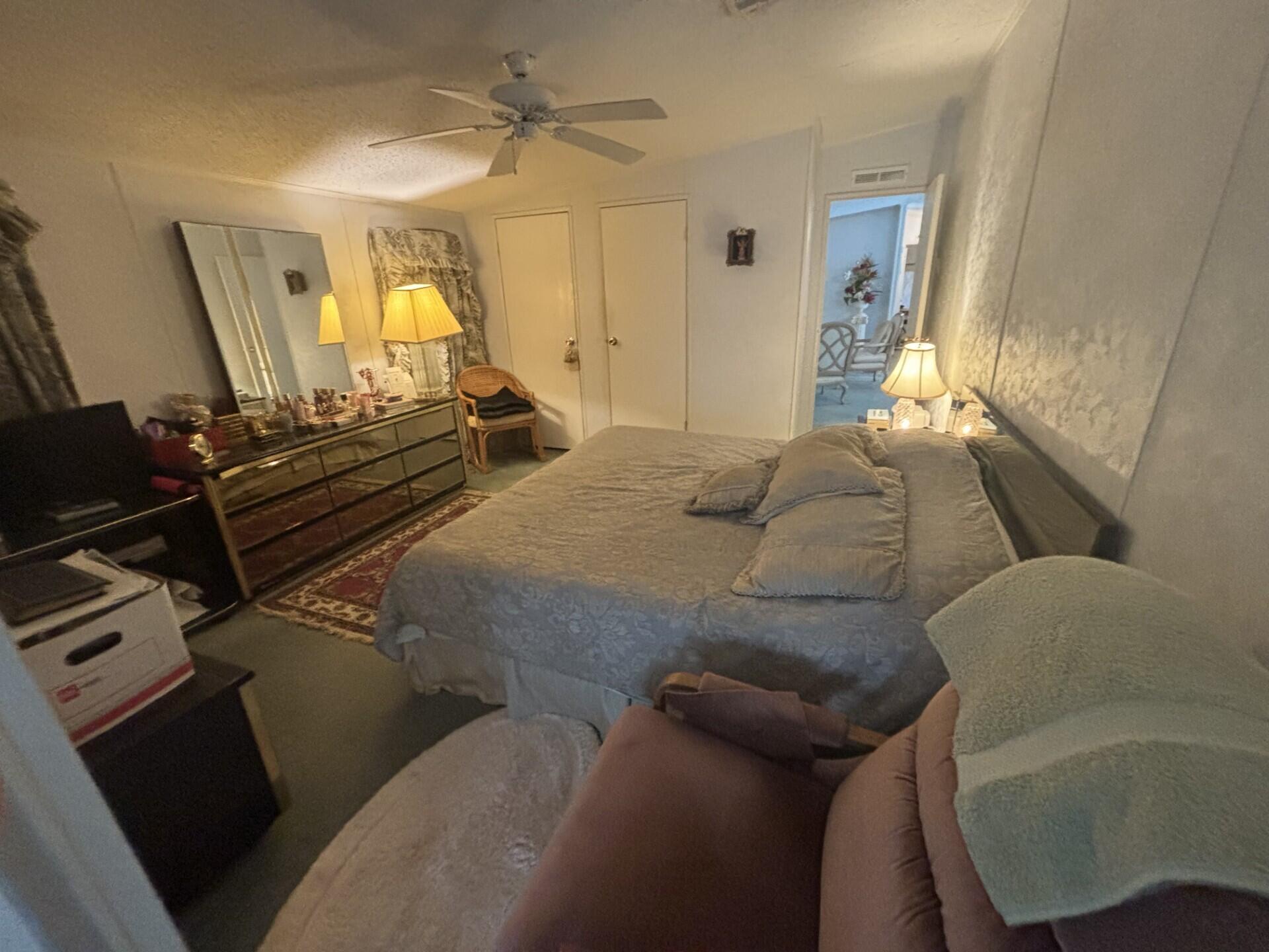 13281 Southwest 10th Manor Davie, FL 33325 - Photo 27 of 43 a bed room with a bed window and a dresser