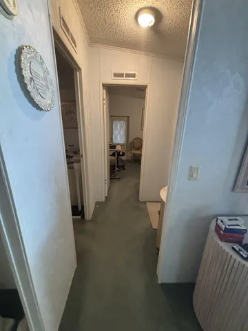 a bedroom with bed and window