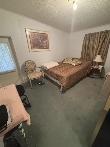 a view of a livingroom with furniture