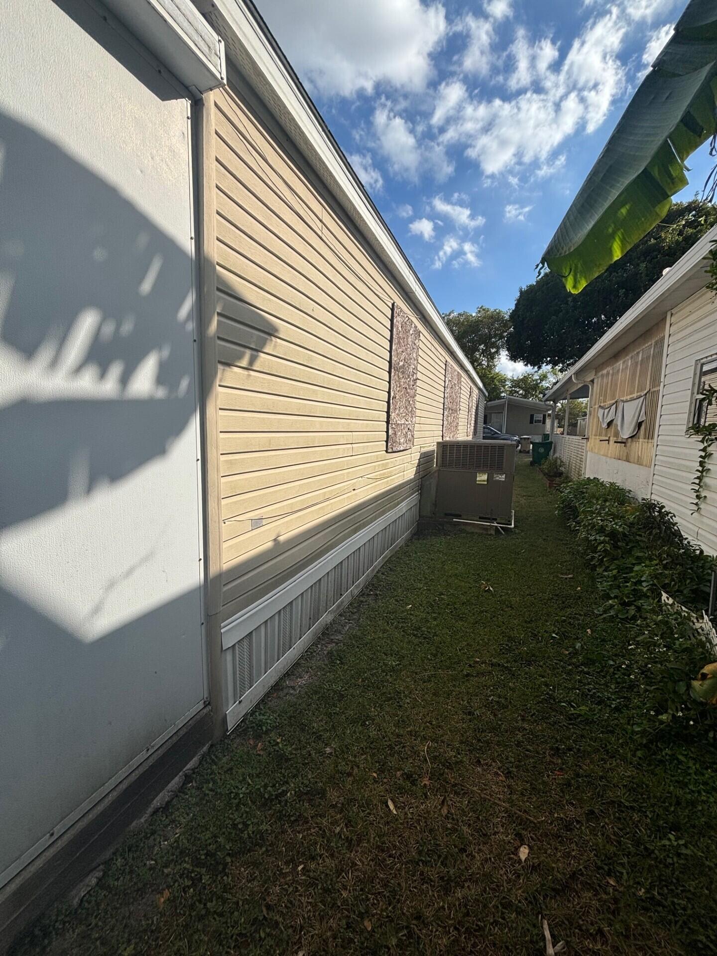 13281 Southwest 10th Manor Davie, FL 33325 - Photo 42 of 43 a view of a backyard with plants and a backyard