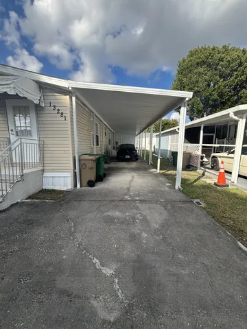 a view of a house with a garage