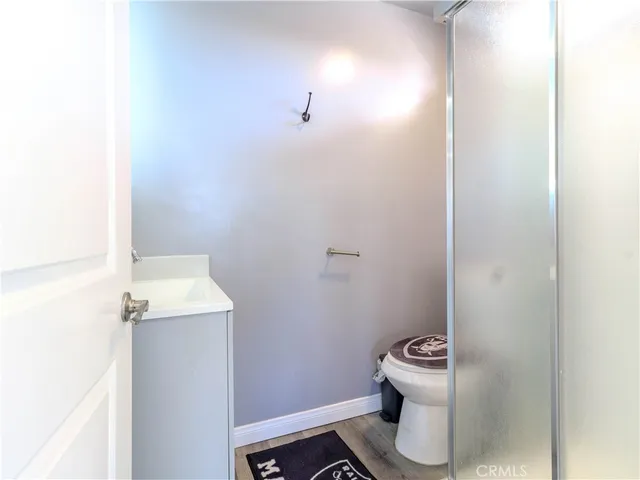 a bathroom with a sink and toilet