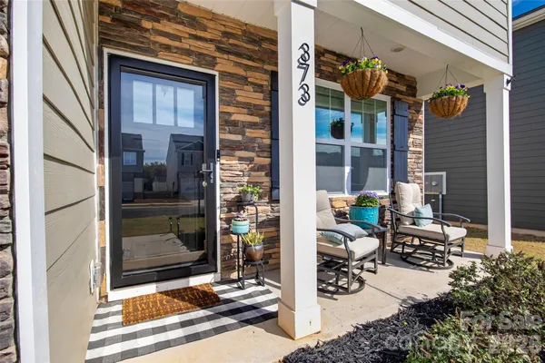 a view of sitting area with glass door and glass door