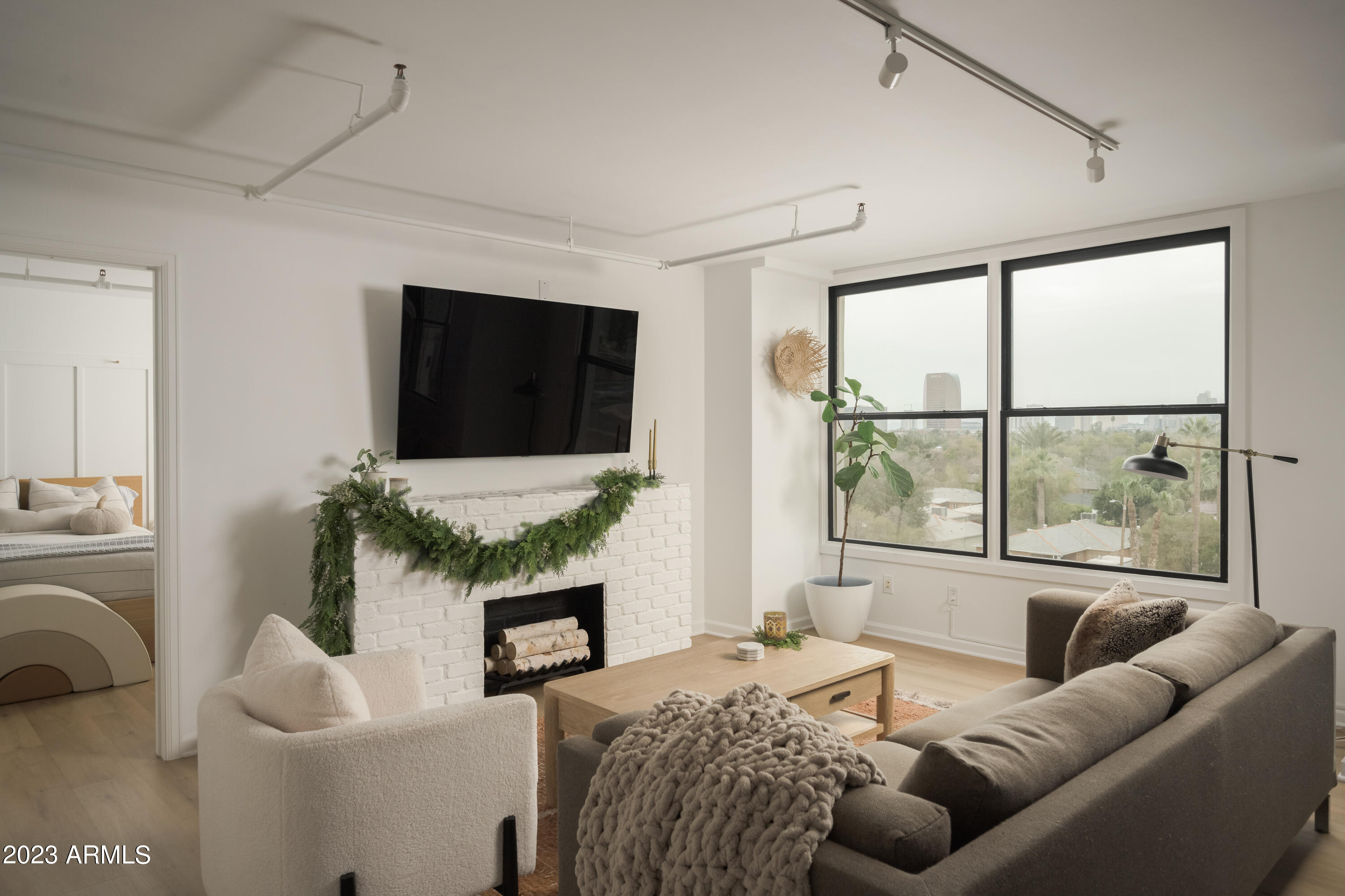 535 West Thomas Road, Unit 508 Phoenix, AZ 85013 - Photo 13 of 20 Living Space with Faux Fireplace